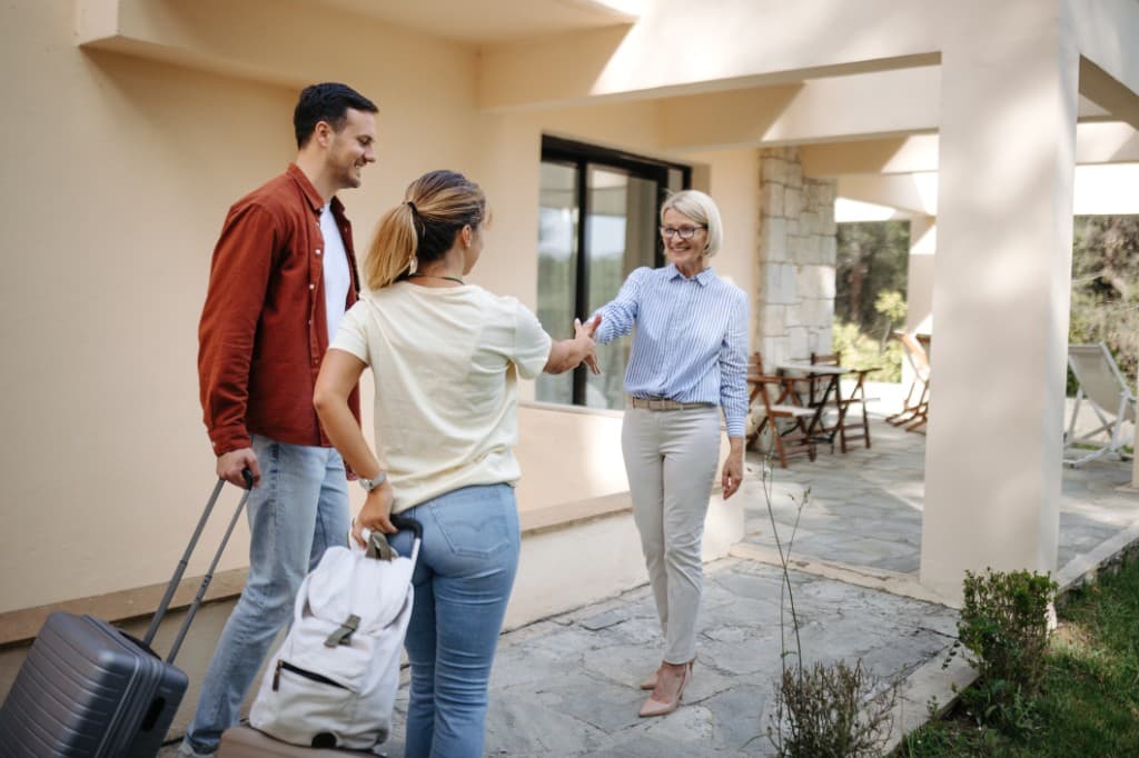 Hosts welcoming guests